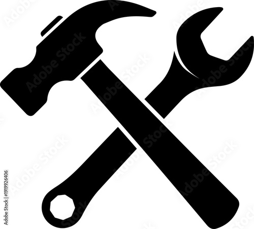 Black silhouette of hammer and wrench crossed over each other