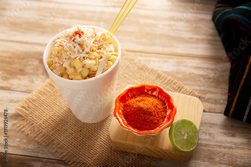 Wallpaper Mural Esquites. Corn kernels cooked and served with mayo, sour cream, lemon and chili powder, very popular street food in Mexico, also known as Elote en Vaso. The recipe varies depending on the region. Torontodigital.ca