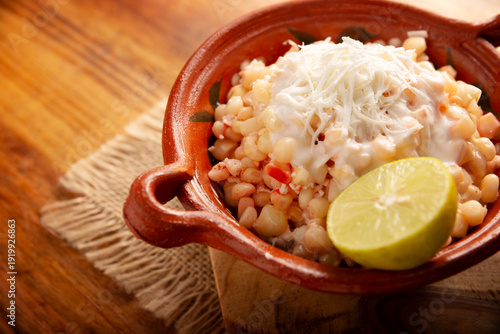 Wallpaper Mural Esquites. Corn kernels cooked and served with mayo, sour cream, lemon and chili powder, very popular street food in Mexico, also known as Elote en Vaso. The recipe varies depending on the region. Torontodigital.ca