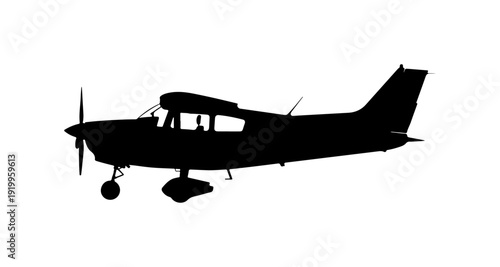 Black and White Silhouette of a Small Propeller Aircraft