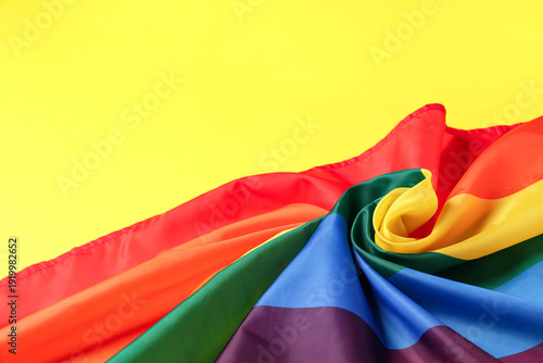 Rainbow flag on yellow back...