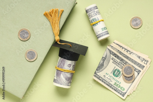 Graduation hat with money a...
