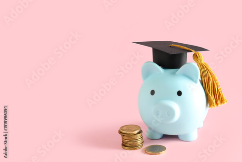 Piggy bank with graduation ...