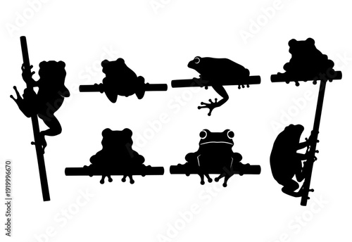 Set of frog silhouettes black amphibian toads climbing and sitting on branches