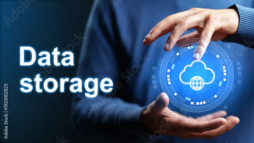 Obraz na plátne Hands display a digital concept of data storage with a cloud symbol on a dark ba