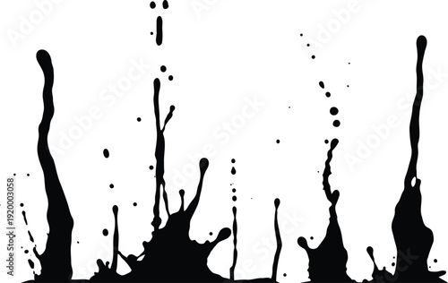 Black liquid splashes and spills on white background