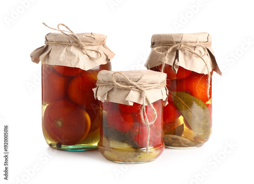 Glass jars with canned toma...