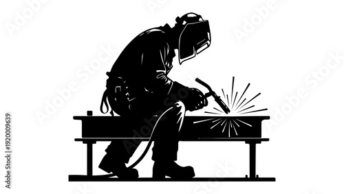 A welder in silhouette working on a metal project with sparks flying