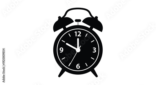 Classic twin bell alarm clock shown in stark black silhouette
