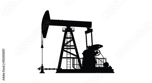 Black silhouette of an oil pump jack operating in a field silhouette