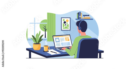 Person working on laptop at home with headphones and coffee