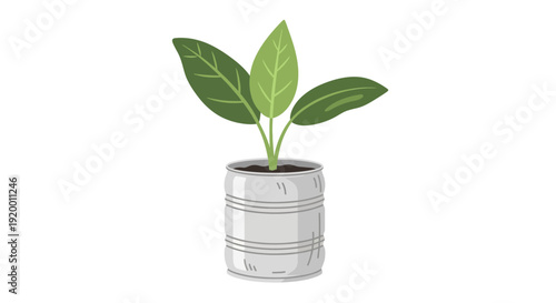 Plant with Green Leaves in a Recycled Metal Can Pot
