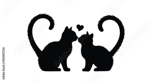 Two cats facing each other with a heart a striking silhouette