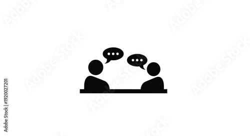 Two people in conversation at a table a stark silhouette
