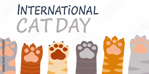 International cat day celebration with colorful paw prints illustration