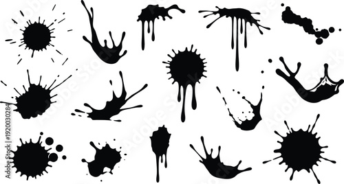 Ink splatters and paint drops on white background for design elements