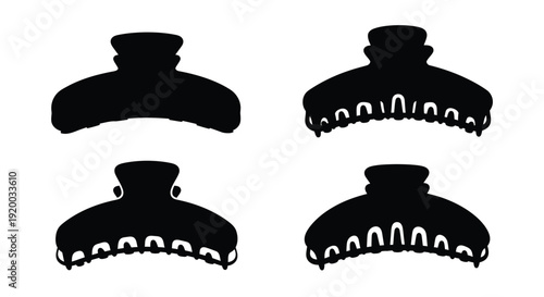 Four black hair clips displayed a striking visual silhouette