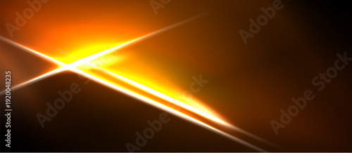Bright orange light flares diagonally across dark background. Intense glow radiates from central point, creating dynamic visual effect.