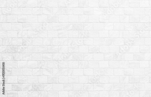 Kitchen wallpaper concept: Close up modern white brick tiles wall texture background, White brick wall texture background for stone tile block in grey light color wallpaper modern interior.