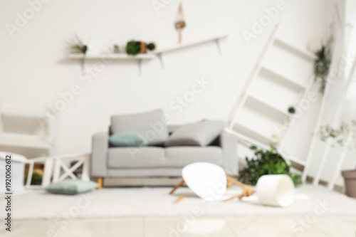 Blurred view of messy livin...
