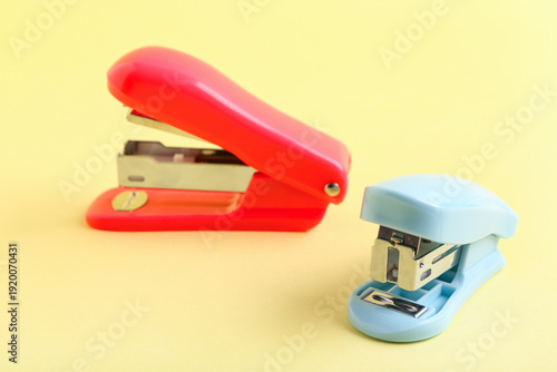 Different staplers on yello...