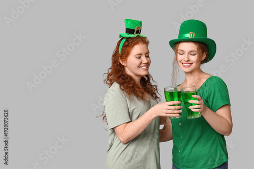 Young redhead women with be...