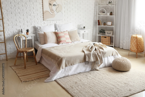 Interior of light bedroom w...