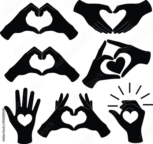 Hands making heart shapes with their fingers