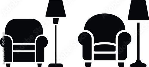 Two armchairs and two lamps in a room