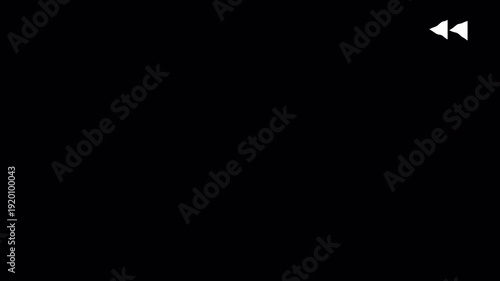 VHS tape rewind big arrows icon symbol middle of the screen effect on 4k Black Screen Film overlay. Analog TV Static and Screen Hiss Loop