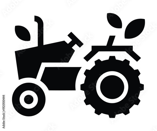 Vector of a tractor with leaves indicating agricultural work