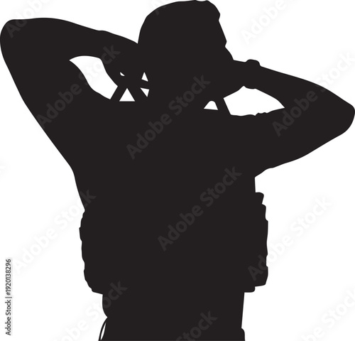 Black silhouette of soldier putting on helmet, vector illustration, military preparation.