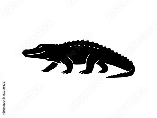 Silhouette of a crocodile walking along a flat surface