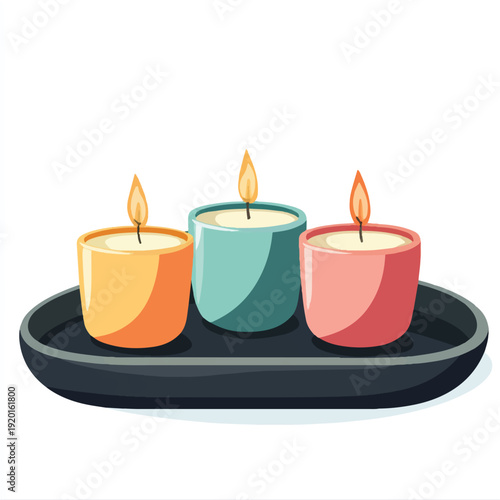 Three colorful candles on a dark tray a relaxing scene.