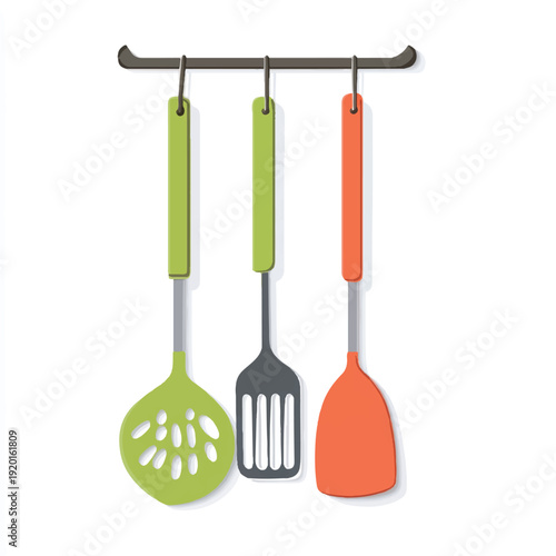 Three colorful kitchen utensils hanging on a rack.