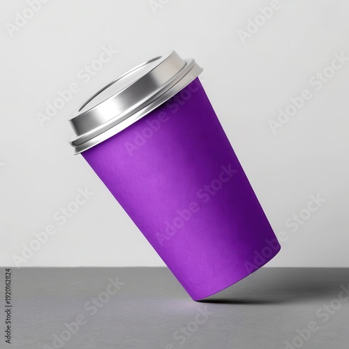 A purple paper coffee cup with a silver lid