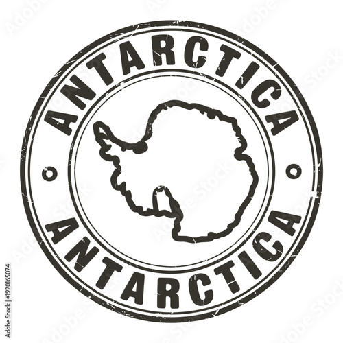 Circular stamp depicting antarctica with continent outline and text