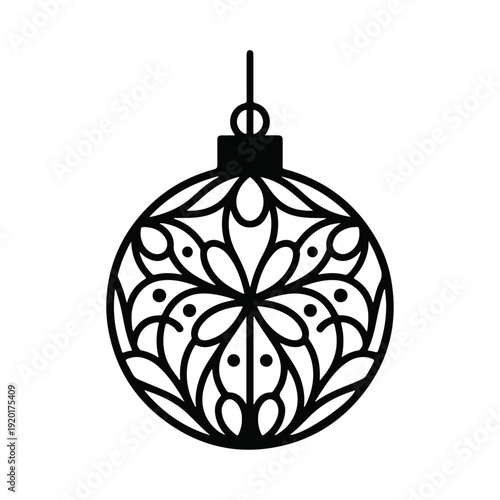 Elegant Christmas ornament with intricate design hanging on thread
