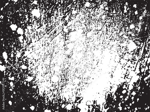 Abstract black and white visual of clustered geometric patterns with bright central focus