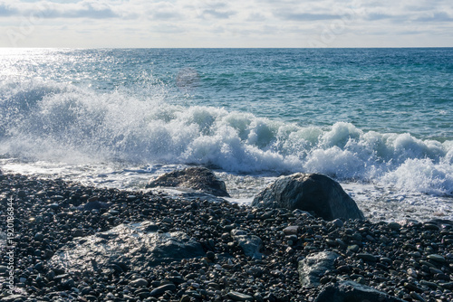 Waves breaking on a pebble beach in the Black Sea