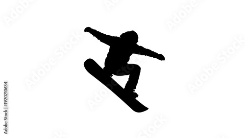 Silhouette of snowboarder performing a jump in mid-air.