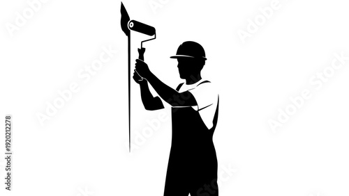 Silhouette of a painter with a roller painting a wall.