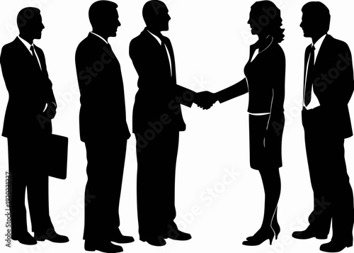 Silhouettes of business people shaking hands representing a deal