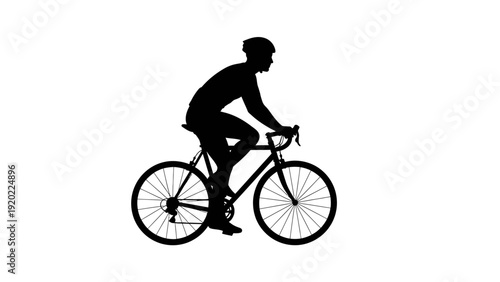 Silhouette of a cyclist riding a bicycle wearing a helmet.