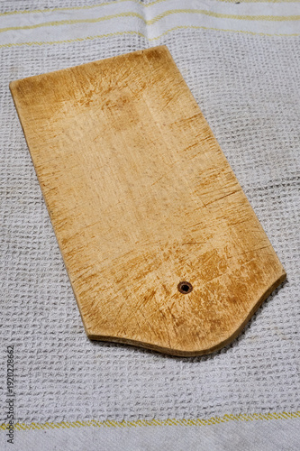 small, worn wooden sandwich board