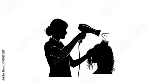 Silhouette of a hairdresser drying a clients hair with a hairdryer.