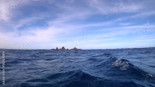 Slow motion of Still View looking straight to worship Rock with choppy Rippling ocean water waves in front and look out to Horizon during good days good weather sunshine daytime in Lanyu orchid island