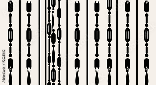 A pattern of black cosmetic brushes in various sizes arranged vertically on a white background from a direct viewpoint
