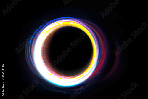 rainbow glowing ring on a black background