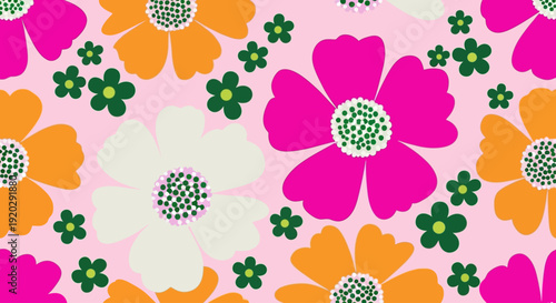 Vibrant floral pattern with colorful flowers and green leaves on a soft pink background viewed from above